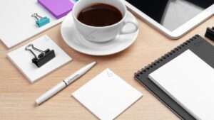 Corporate identity design template on wooden desk close up Corporate identity design template on wooden desk close up