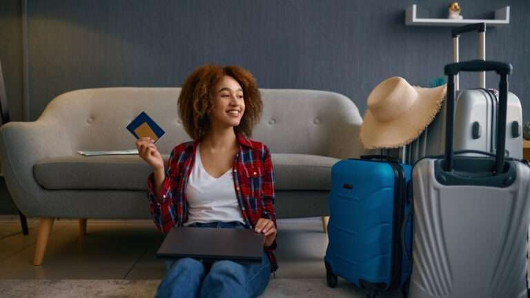 Smiling woman rejoice in successful tour booking