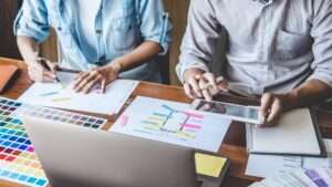 Team of Creative Web/Graphic Designer planning Team of Creative Web/Graphic Designer planning